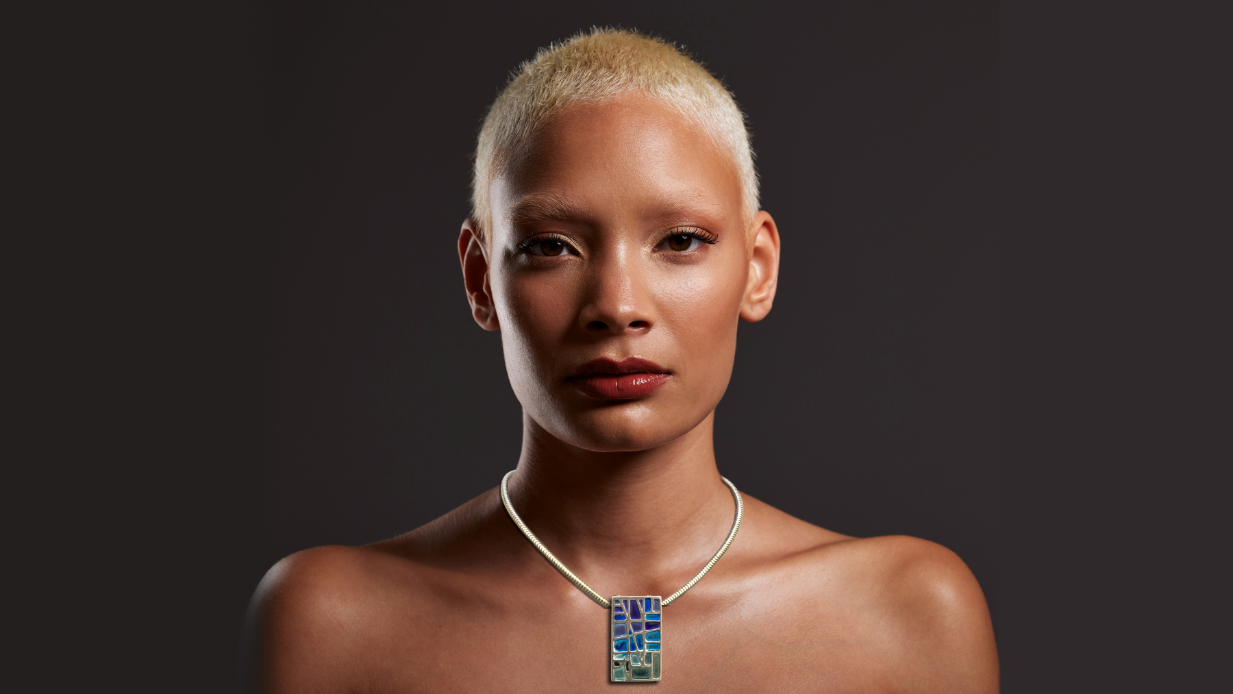a woman modelling Monkhaven jewellery